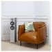 Monitor Audio Bronze 200 Floorstanding Speakers (Pair), Urban Grey next to a chair