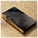 Astell&Kern A&ultima SP3000 Hi-Res Player, Limited Edition Gold - against glitter background