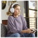 JBL Quantum 100 Gaming-Wired Over-ear Headset, White - Lifestyle connected to controller