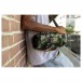 JBL Xtreme 4 Portable Bluetooth Speaker, Camo - Lifestyle image shoulder strap attached