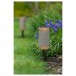 Kitsound Diggit 55 Portable Bluetooth Speaker, Natural Wood - lifestyle image showing Diggit used as a garden speaker