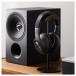 Technics EAH-A800 Wireless Noise Cancelling Headphones, Black - Lifestyle Image in Hi-Fi System, sat next to SB-C600E-K Bookshel