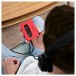 FiiO CP13 Cassette Player, Red - Lifestyle Image, handheld listening through headphones