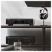 Denon AH-D7200 Reference Quality Over-Ear Headphones - Lifestyle view, headphone stand