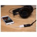 AudioQuest DragonFly Black USB DAC - Lifestyle view connecting headphones and smart phone