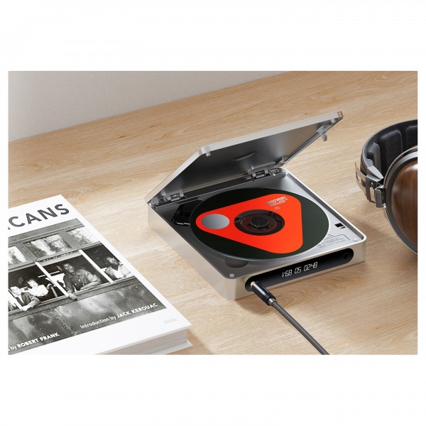 FiiO DM13 Portable CD Player - Lifestyle image, with CD in disc tray