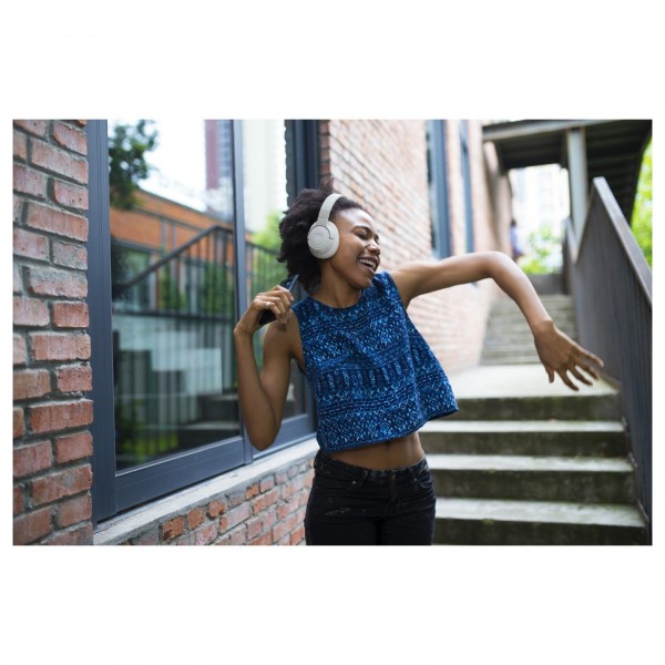 JBL Tune 770NC Wireless Over-ear Headphones - Lifestyle Image, dancing