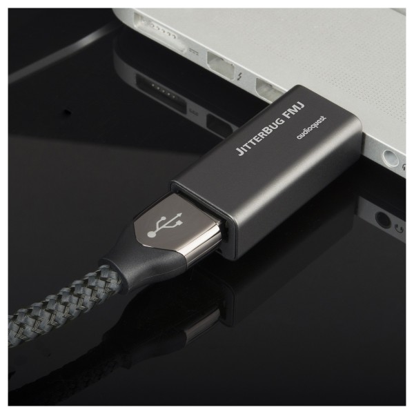 AudioQuest Jitterbug FMJ USB Filter - Lifestyle Image, used with macbook, and Carbon USB cable