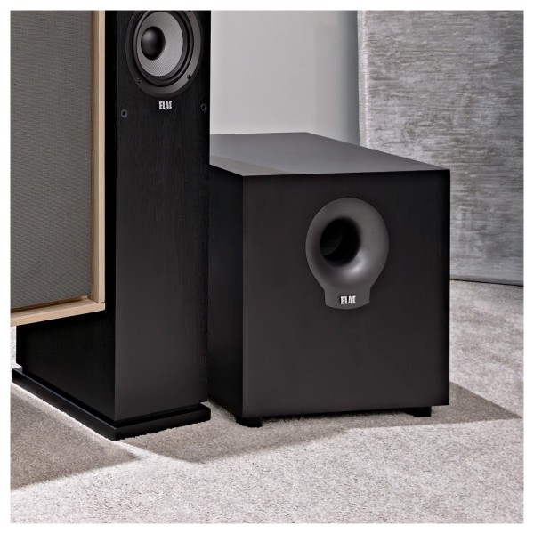 ELAC Debut 2.0 SUB10.2 Subwoofer, Black Ash - lifestyle in corner 