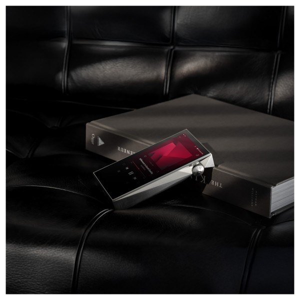 Astell&Kern A&ultima SP3000M Hi-Res Digital Audio Player, Copper Nickel - on black couch 