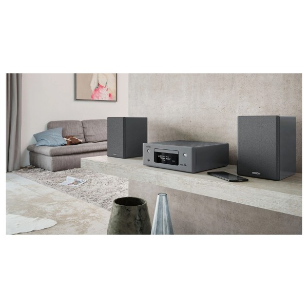 Denon CEOL RCD-N10 Network CD Music System, Gloss Grey - Lifestyle image, in living room with SCN10 Bookshelf Speakers