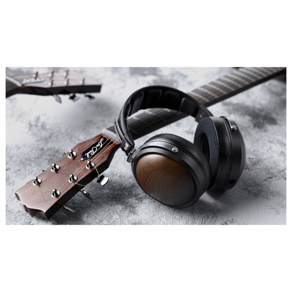 FiiO FT1 32Ω Closed-Back Headphones, Black - Lifestyle image, guitar headstock