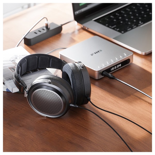 FiiO FT1 Pro Open-Back Planar Magnetic Headphones, Black - Lifestyle Image, in-use connected to FiiO DM13 Portable CD Player