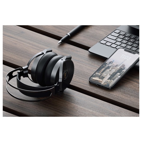 FiiO FT5 Open-Back Planar Magnetic Headphones, Black - Lifestyle Image, next to phone and laptop