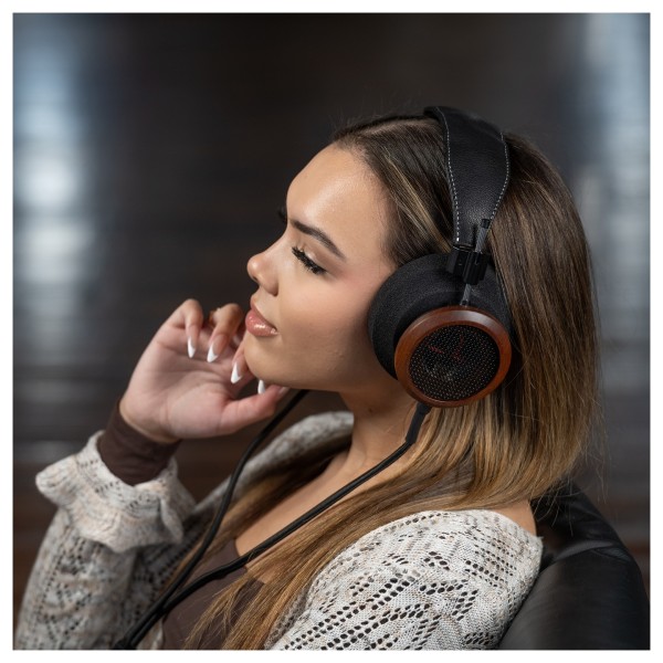 Grado Signature S950 Open-back Headphones, Brazilian Walnut - woman looking sideways 