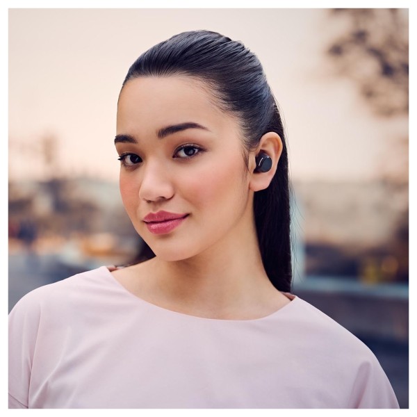 Panasonic RZ-B120WDE Digital Wireless Stereo Earphones, Black - Lifestyle image, modelled