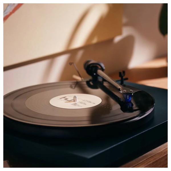 Ortofon 2M Blue Moving Magnet Cartridge - Lifestyle Image, tracking groove on turntable