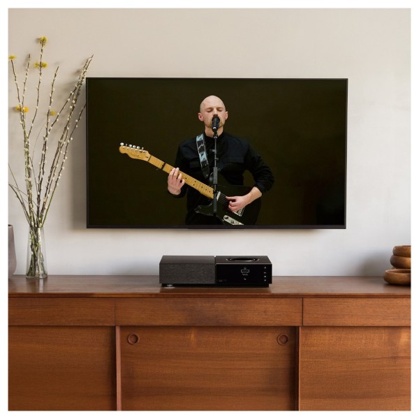 Naim Uniti Nova Audiophile All-in-One System - on wooden side table 