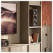 KEF Q6 Meta Centre Speaker, Walnut - Lifestyle Image, Q6 Meta on side