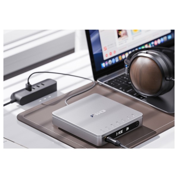 FiiO DM13 Portable CD Player - Lifestyle image, being used in Desktop Mode