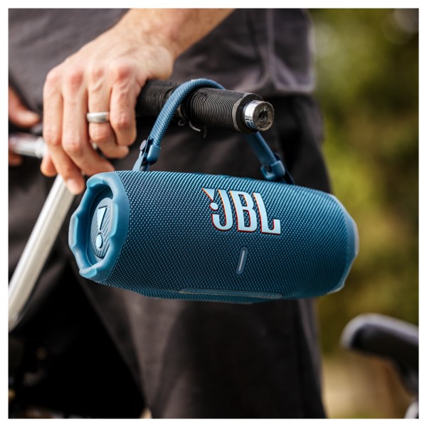 JBL Charge 6 Portable Bluetooth Speaker - Lifestyle Image, Outdoors, looped on bike handle
