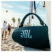 JBL Charge 6 Portable Bluetooth Speaker - Lifestyle Image, Outdoors, up close at beach