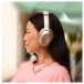 JBL Tour One M3 Wireless Over Ear Headphones, Latte - Immersed using Active Noise Cancellation - Lifestyle Image