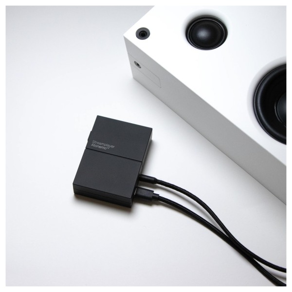 Atonemo Streamplayer - Lifestyle Image, connected to speaker