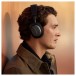 Bowers & Wilkins Px7 S3 Wireless Headphones, Anthracite Black - Lifestyle image, worn by man