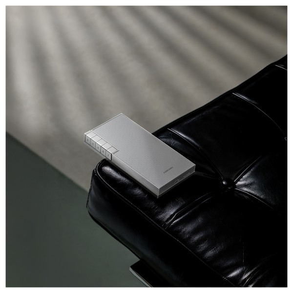 Astell & Kern PD10 Digital Audio Player and Docking Cradle - lifestyle - sofa edge