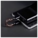 FiiO BTR17 Flagship Bluetooth Headphone Amplifier, Black - Lifestyle image, connected to phone