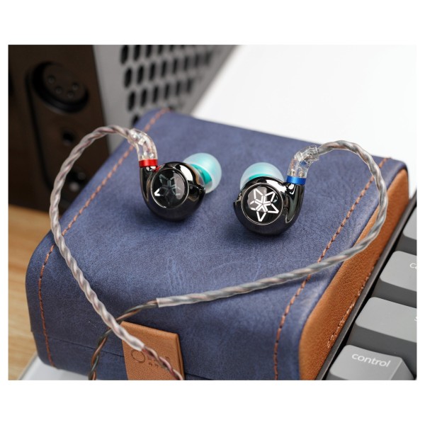 FiiO FH11 Carbon Based Diaphragm In Ear Monitors - Lifestyle image, on desktop, near FiiO R7 Network Player