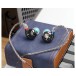 FiiO FH11 Carbon Based Diaphragm In Ear Monitors - Lifestyle image, on desktop, near FiiO R7 Network Player