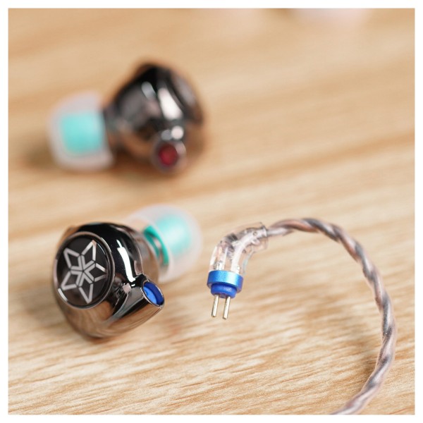 FiiO FH11 Carbon Based Diaphragm In Ear Monitors - Lifestyle image, 2-pin cable detached from ear piece
