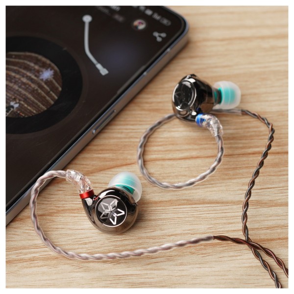 FiiO FH11 Carbon Based Diaphragm In Ear Monitors - Lifestyle image, on desktop connected to smart phone