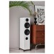 Elipson Prestige Facet II 14F Floorstanding Speaker, White Matt - Lifestyle image, living room, angled, no grille