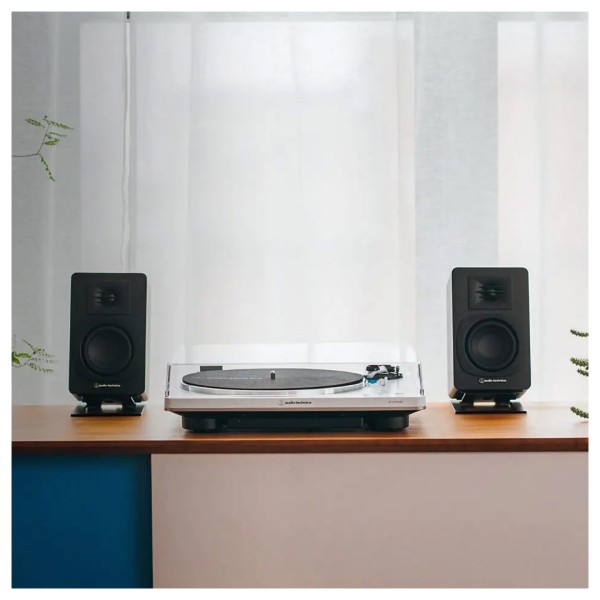 Audio-Technica AT-SP3XWH Powered Bookshelf Speakers, White - lifestyle 2 