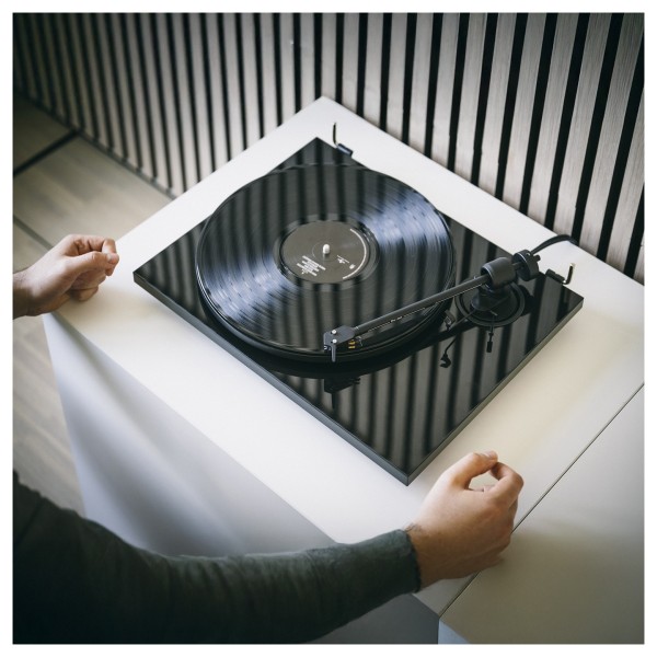 Pro-Ject E1.2 Turntable, Black - plinth hands 