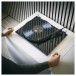 Pro-Ject E1.2 Turntable, Black - plinth hands 