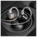 FiiO JD1 In-Ear Earphones, Black - Lifestyle image, on FiiO SP3 Active Speaker