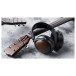 FiiO FT1 32Ω Closed-Back Headphones, Black - Lifestyle image, guitar headstock