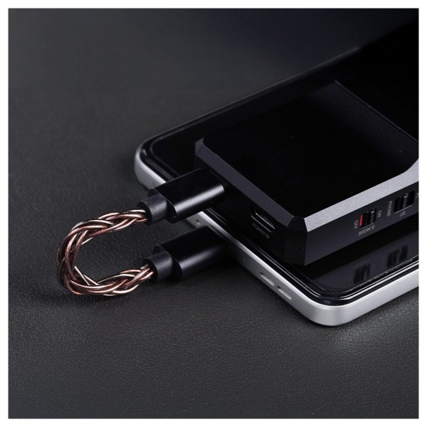 FiiO BTR17 Flagship Bluetooth Headphone Amplifier, Black - Lifestyle image, connected to phone