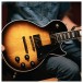 Gibson Les Paul Custom 70s, Tobacco Burst - being held by a player