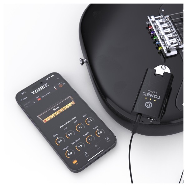 IK Multimedia TONEX Plug Tone Modeling Headphone Amplifier for Guitar - Lifestyle (Phone and Guitar Not Included)