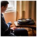 Pro-Ject Debut Carbon Evo Turntable, Satin Black - Lifestyle image, listening to turntable
