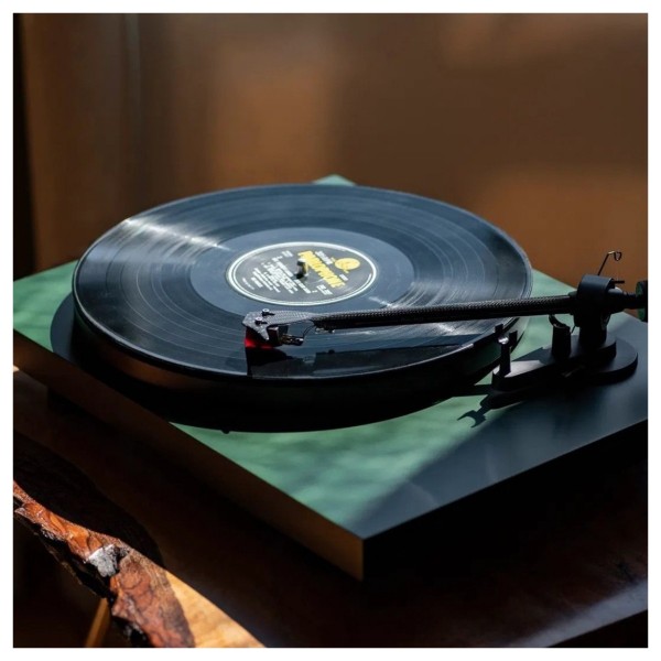 Pro-Ject Debut Carbon Evo Turntable - Lifetsyle image, playing record