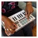 Akai Professional MPK Mini MK4 Compact MIDI Keyboard & Pad Controller, Grey - Lifestyle 2