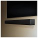 TCL Q65HK 5.1 Channel Dolby Atmos Soundbar with Wireless Subwoofer - lifestyle wall mount