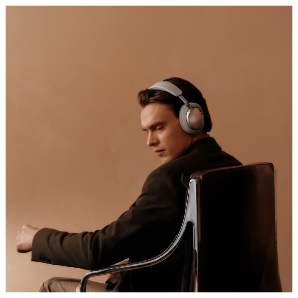 Bowers & Wilkins Px8 S2 Wireless Headphones, Pearl Blue - lifestyle  chair glare