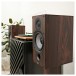 ELAC Debut B6.2 Bookshelf Speaker (Pair), Walnut - Lifestyle, up-close, showing walnut vinyl finish